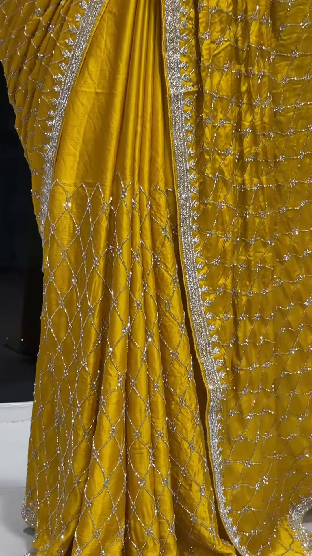 Radiant Yellow Georgette Saree with All-Over Sequin Lattice Pattern and Ornate Silver Zari Border - Image 2